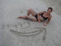 happiness is a beach in the Caribbean